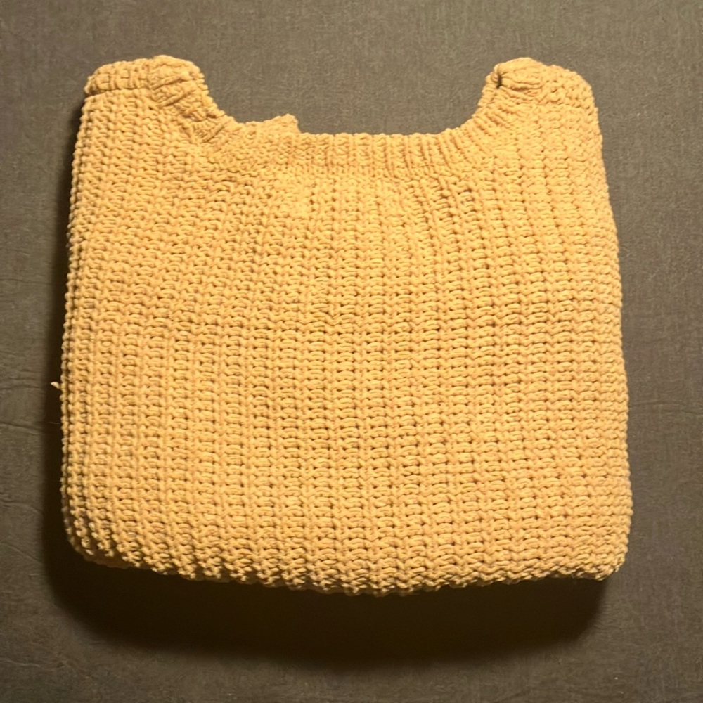 A thick knit, fuzzy sweater.
